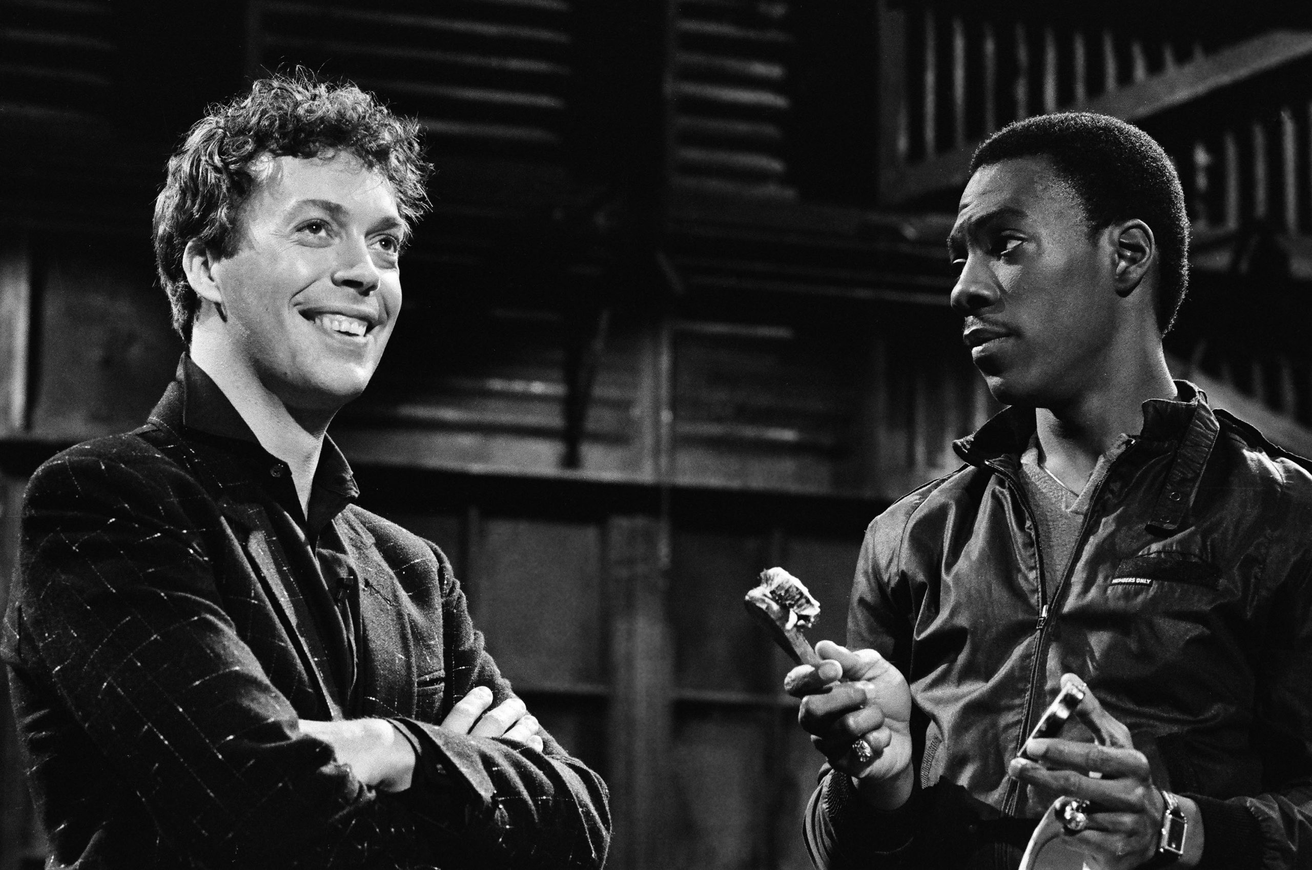 Tim Curry and Eddie Murphy during the monologue on