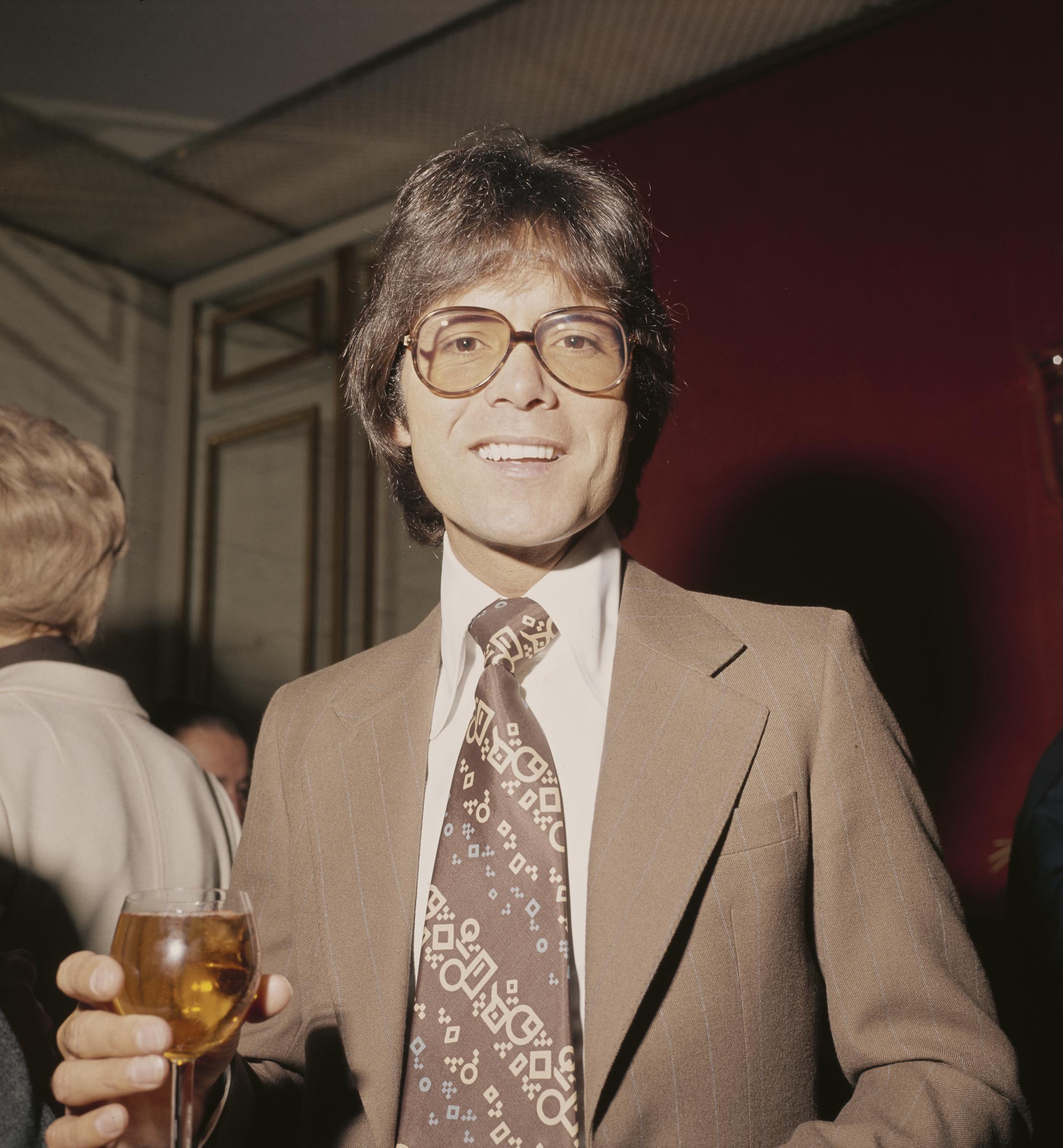 Sir Cliff Richard at a Variety Club Luncheon in July 1975. | Source: Getty Images