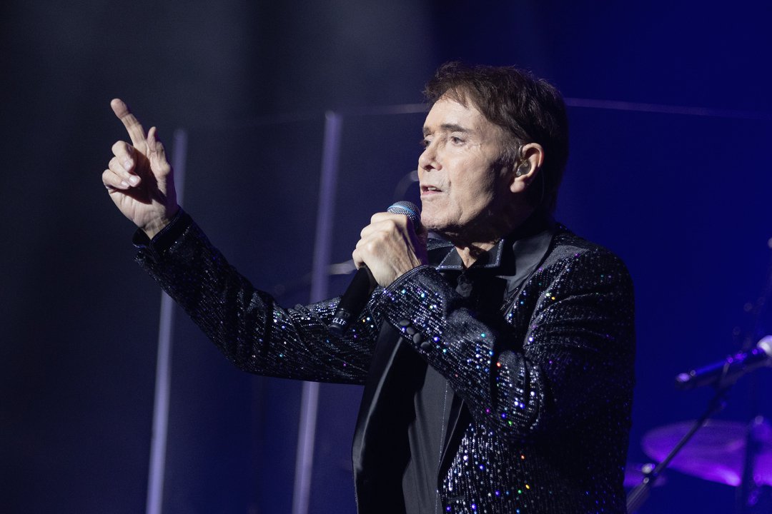 Sir Cliff Richard onstage during a concert on December 8, 2025, in London, England. | Source: Getty Images