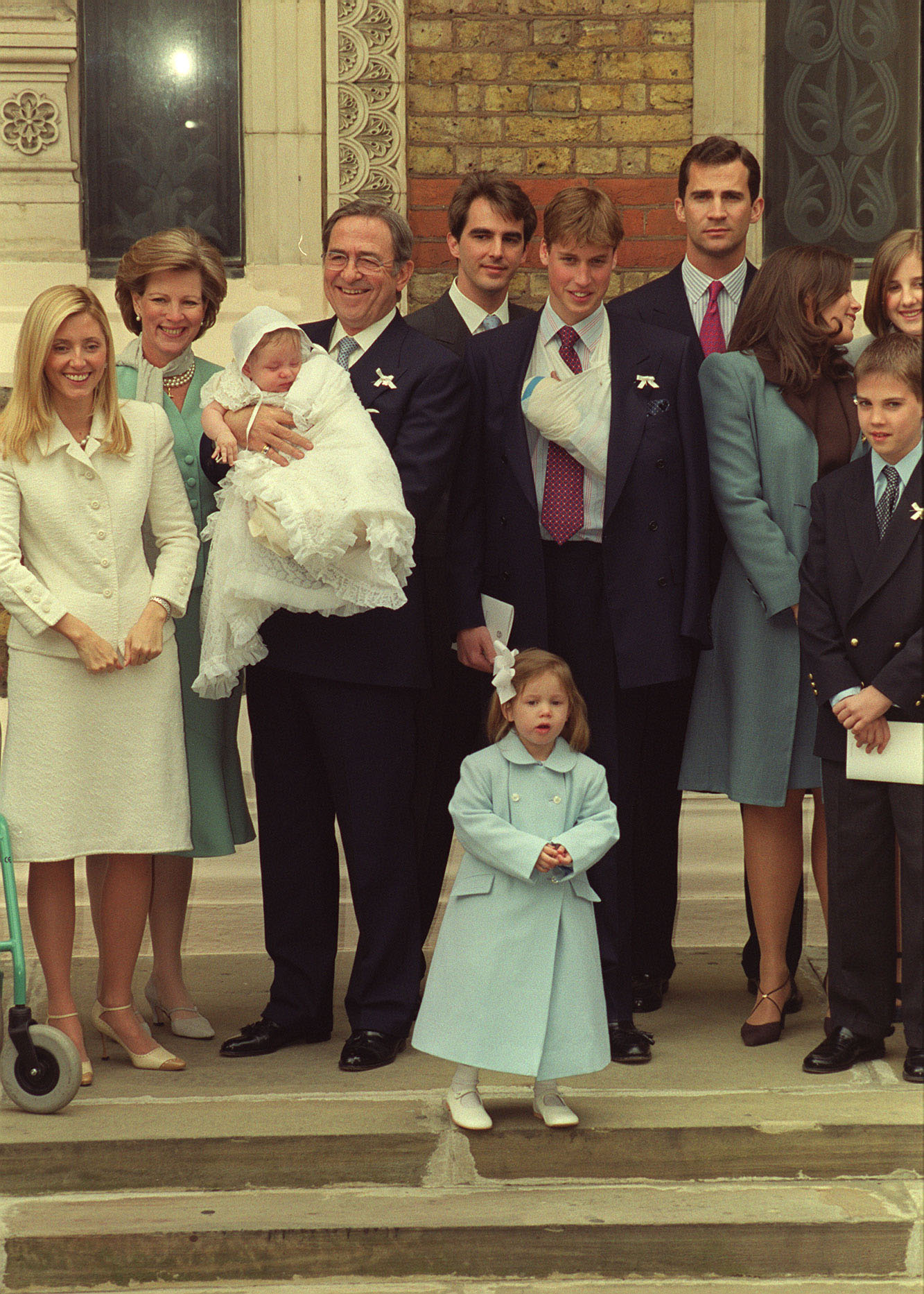 A formal family portrait captured multiple generations of European royalty, including Crown Princess Marie-Chantal, King Constantine II, Prince William, and King Felipe VI of Spain, gathered to celebrate the christening of Prince Constantine-Alexios.