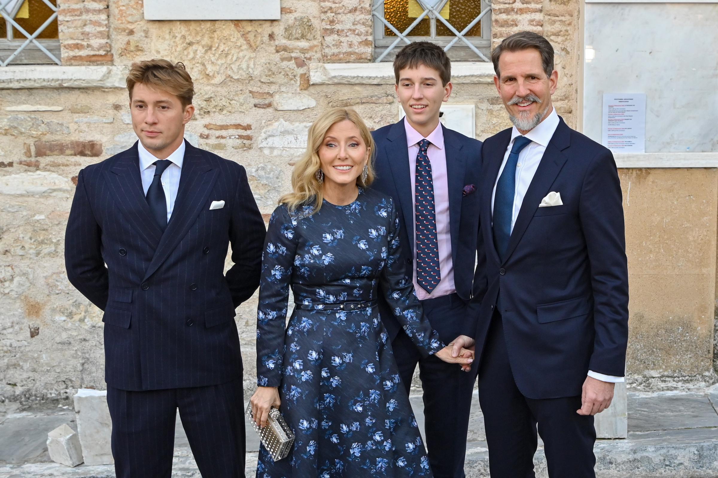 Crown Prince Pavlos and Crown Princess Marie-Chantal of Greece arrived in Athens with their sons, Prince Constantine-Alexios and Prince Aristides-Stavros, to attend the wedding of Prince Nicholas of Greece and Chrysi Vardinogianni at the Church of St. Nicholas of Rangava on February 7, 2025.
