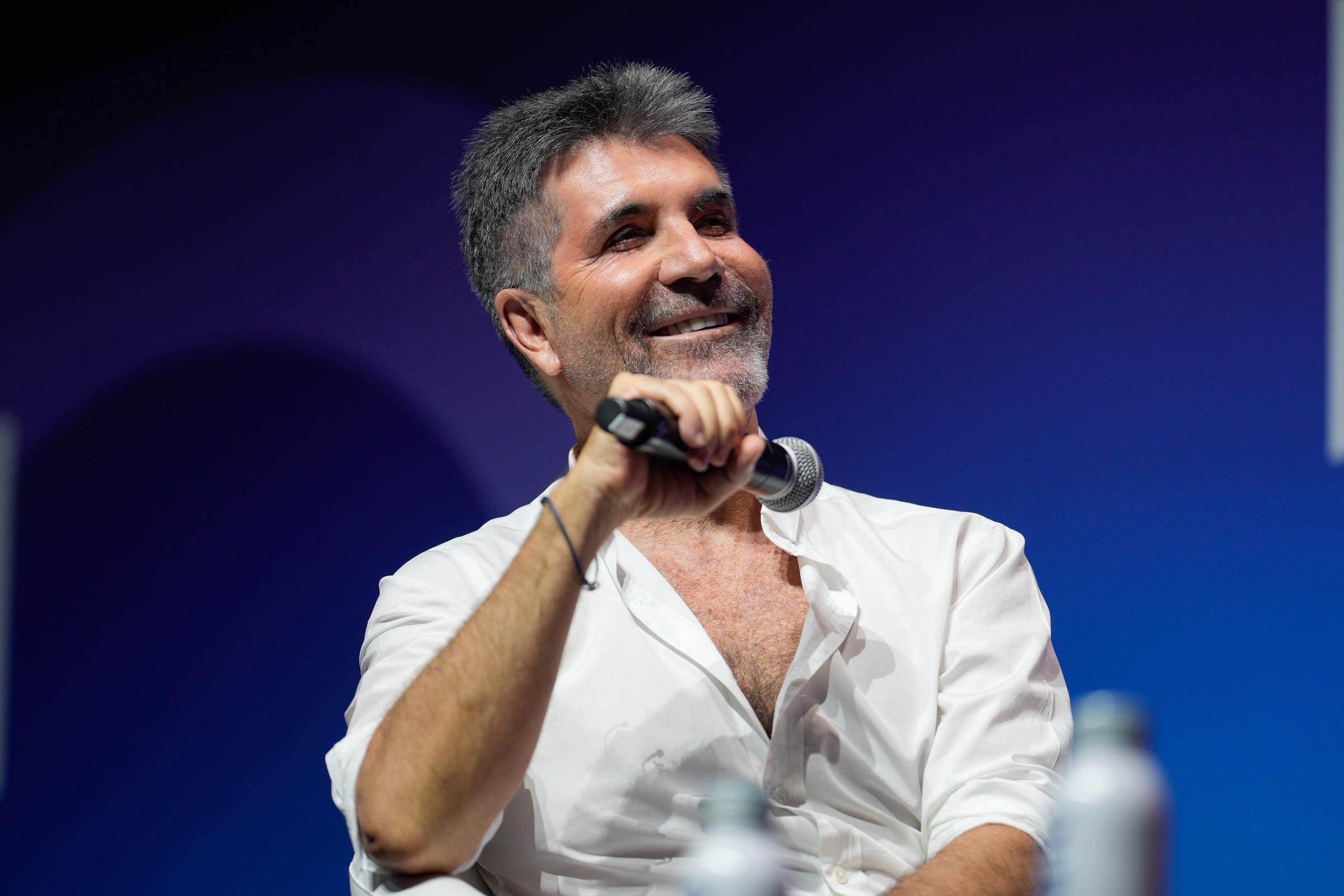 Onstage in Lisbon in June 2025, Cowell addresses the ICON conference with a relaxed smile. Decades into his reign, the once-feared judge reflects on his legacy &mdash; the hits, the headlines, the cultural empire he built from scratch.