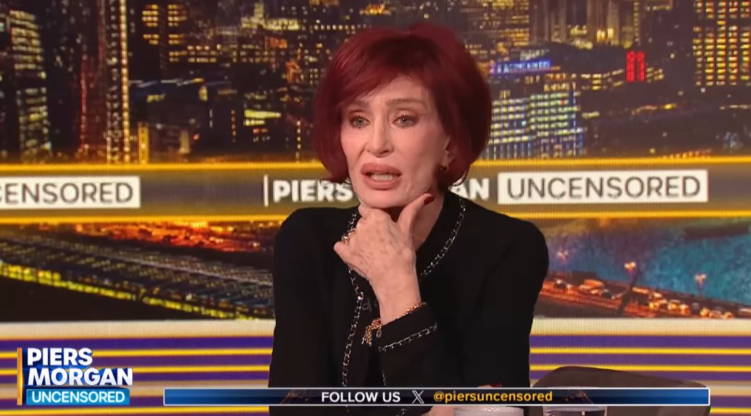 Sharon Osbourne gestures while speaking emotionally during her interview on