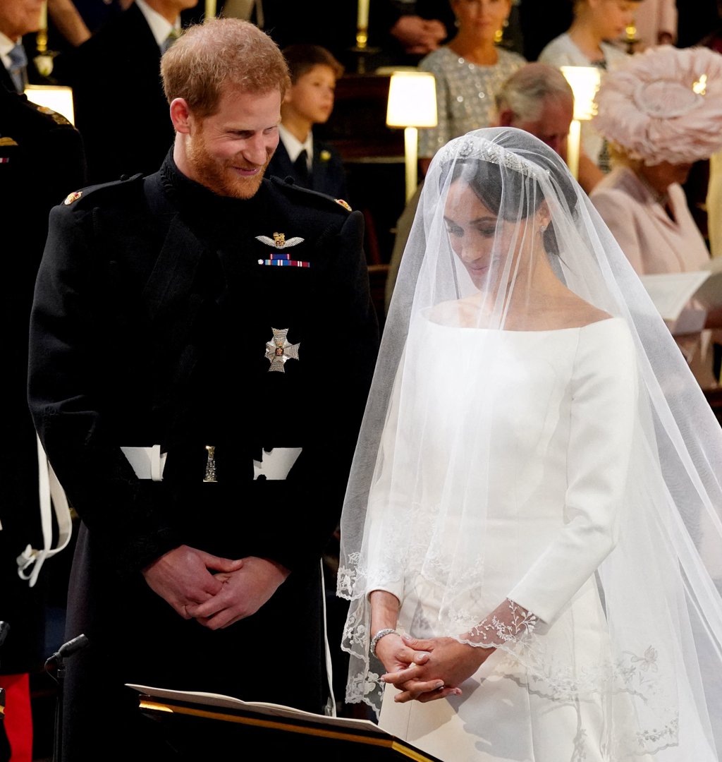 Prince Harry and Meghan Markle at the High Altar during their wedding at St. George's Chapel, Windsor Castle, on May 19, 2018 | Source: Getty Images