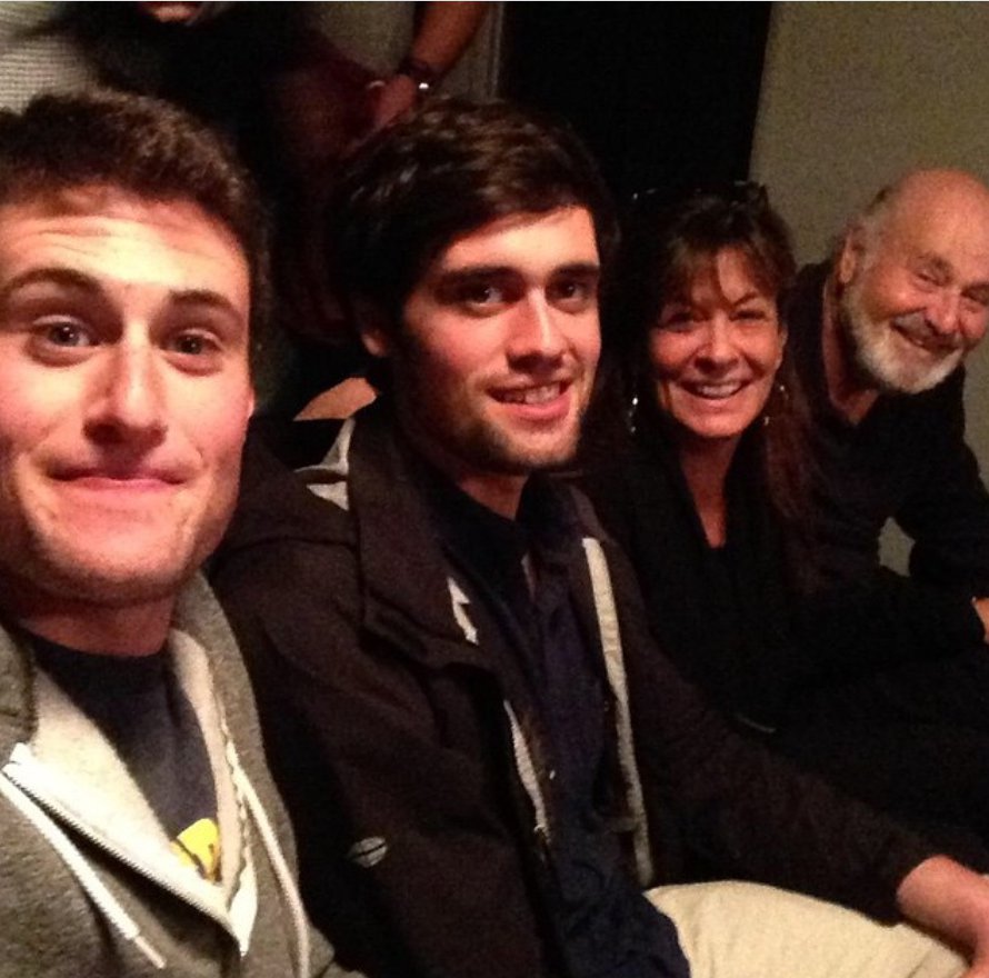 Jake Reiner takes a close-up group selfie with his family, including his sibling Nick, in a dimly lit indoor setting in a post dated November 17, 2014. | Source: Instagram/michelereiner
