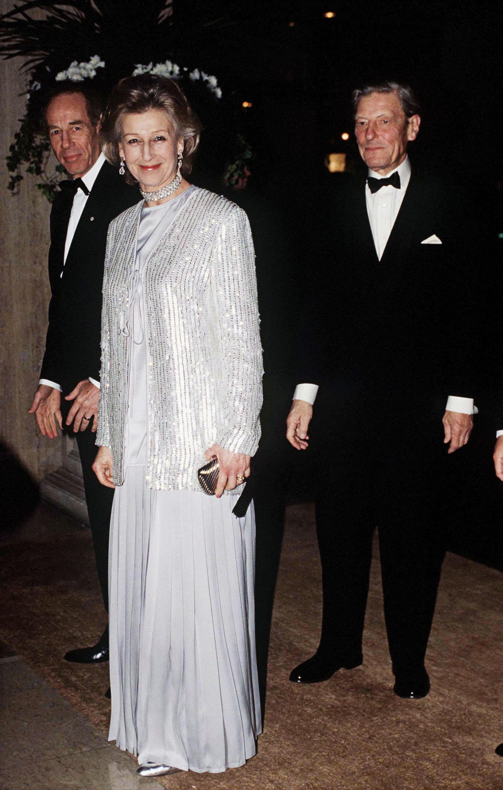 Princess Alexandra radiates soft sophistication at the Four Seasons Hotel in London, attending a gala dinner for the British Red Cross's 125th anniversary. Wearing a flowing pale gown and shimmering jacket, she joins Sir Angus Ogilvy in support of a cause close to her heart.