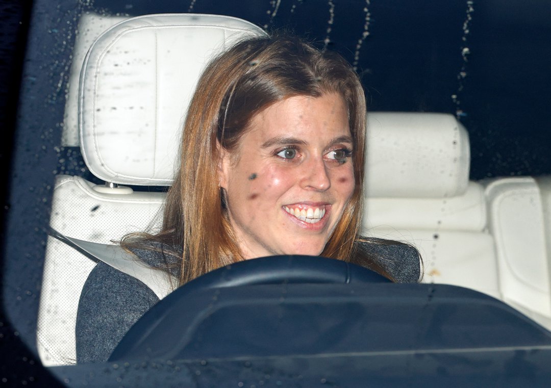 Behind the wheel, Princess Beatrice appeared relaxed and cheerful as she made her way into the Palace grounds, offering a closer glimpse of the York royal arriving for the festive gathering. The candid moment captured her in good spirits, underscoring the ease with which she joined the wider family celebrations hosted by King Charles III.
