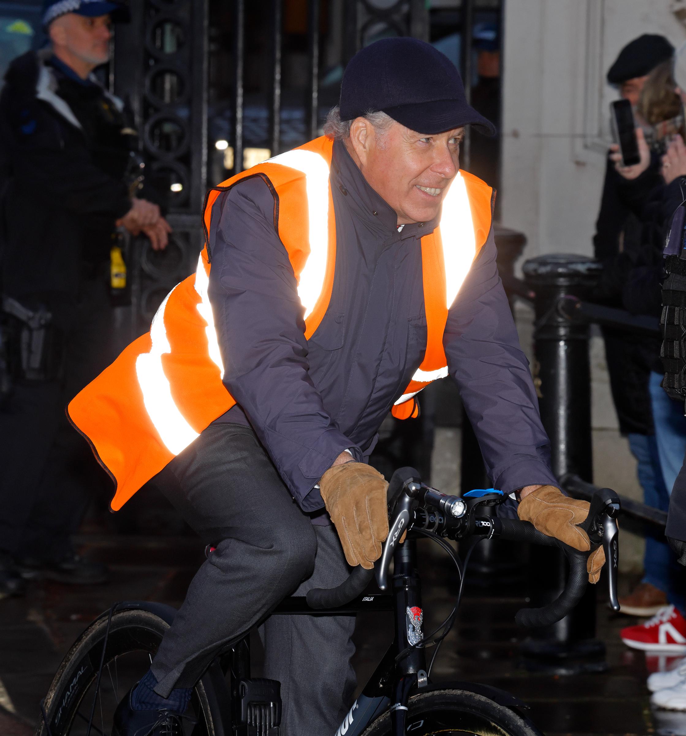 As he approached the entrance, the King's nephew flashed a cheerful smile &mdash; unaware, perhaps, that his cycling arrival would spark a flurry of online speculation and admiration, with one person even mistaking him for Andrew Mountbatten-Windsor.