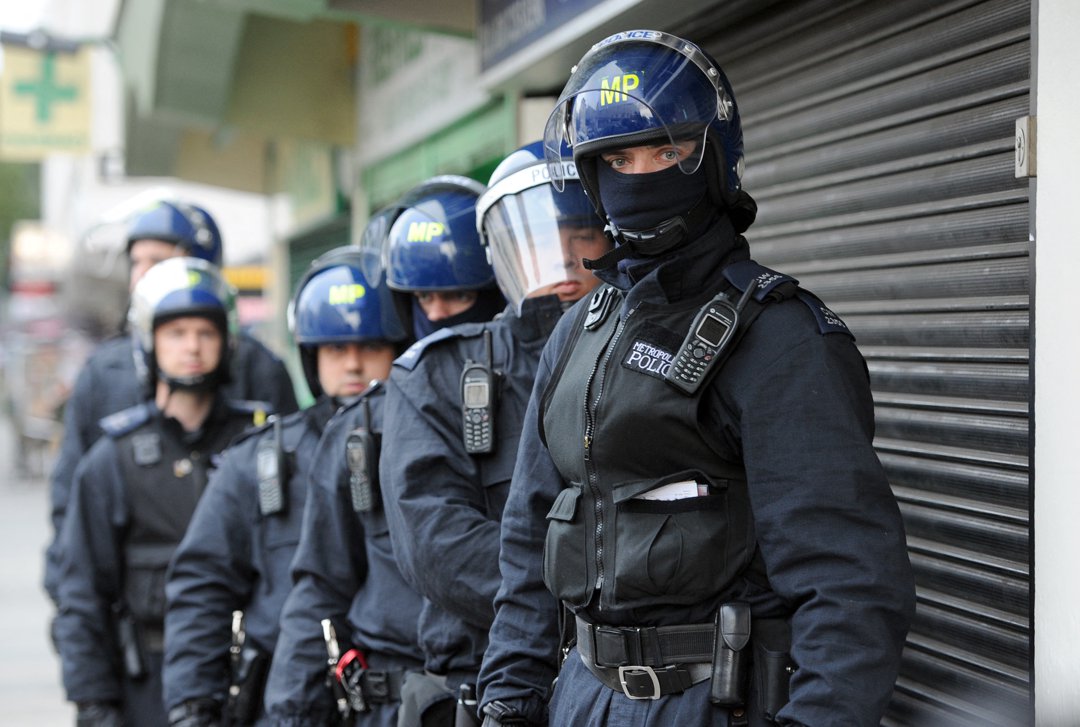 Police carrying out a raid in Woodstock, England. | Source: Getty Images