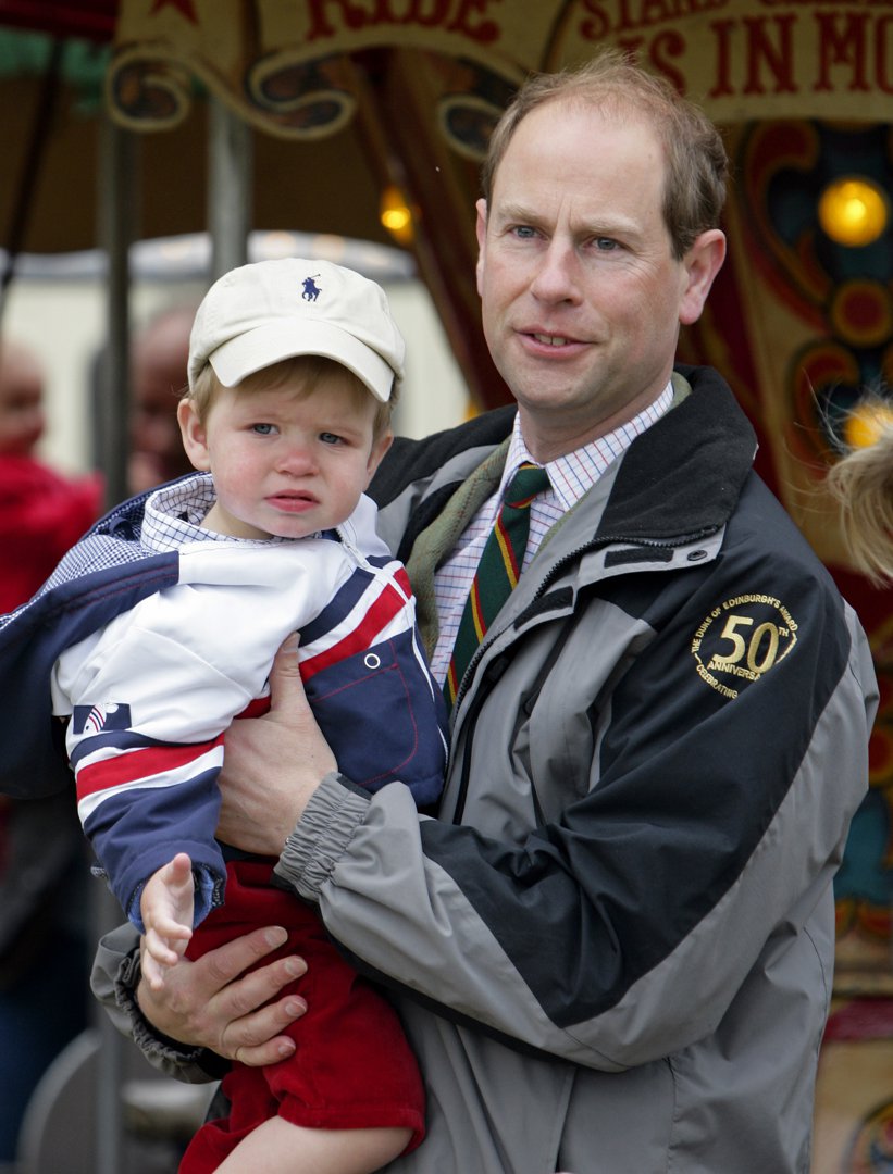 Father and son steal the show: Edward holds a wide-eyed James during day five of the Royal Windsor Horse Show on 16 May 2009. The heartwarming appearance captured the future Duke of Edinburgh introducing his toddler to a beloved royal tradition.