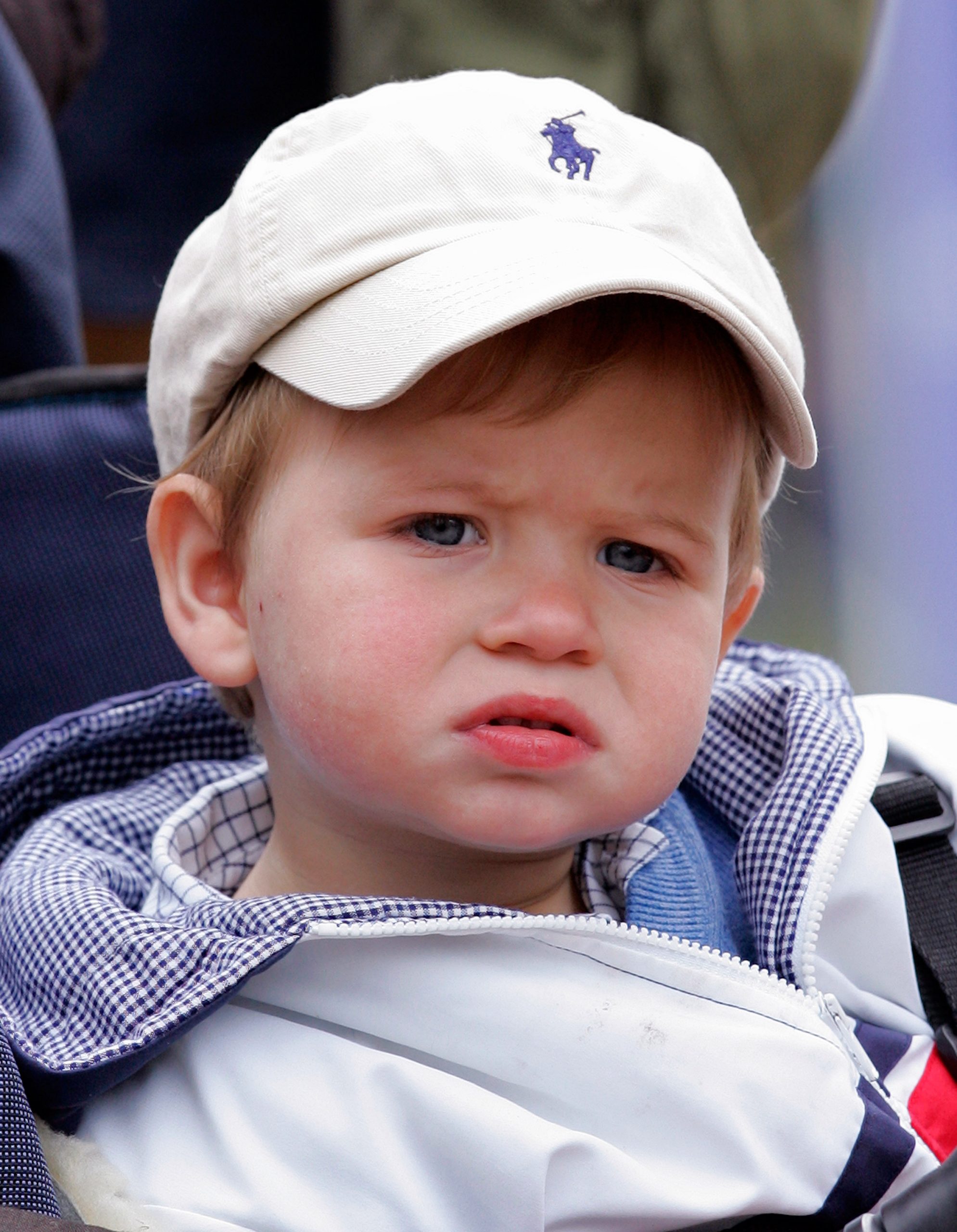 Little James gazes on with wonder during the Royal Windsor Horse Show in May 2009. The young Viscount Severn joined his father, Prince Edward, for a rare public appearance &mdash; charming royal watchers with his curious expression and quiet poise.