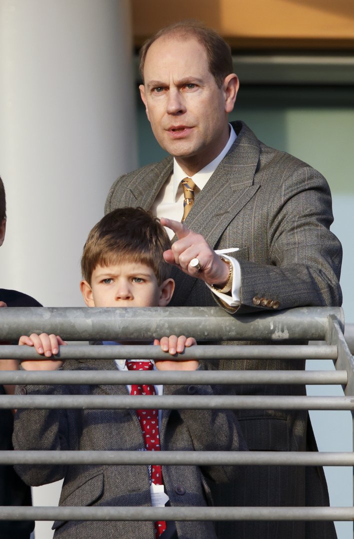 A festive day out for father and son: Edward and James soak in the winter cheer at Ascot Racecourse's Christmas Meeting on 20 December 2014. The pair were spotted enjoying the race-day buzz from the balcony in a relaxed royal moment.