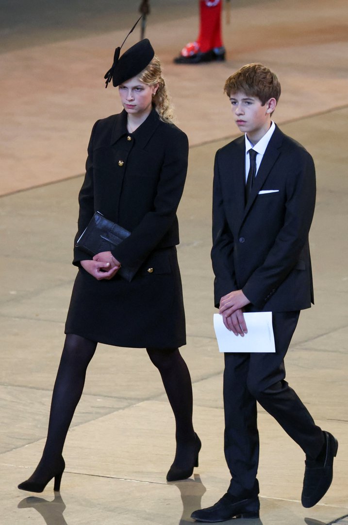 A solemn procession: James and Louise walk behind Queen Elizabeth II's coffin as it arrives at Westminster Hall on 14 September 2022. The young royals joined senior family members in an emotional tribute as the late monarch lay in state.