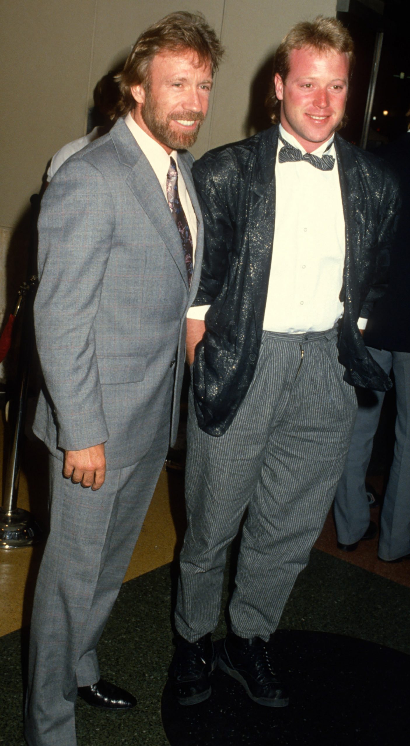 Chuck Norris and his son, Mike Norris, attend a premiere of 