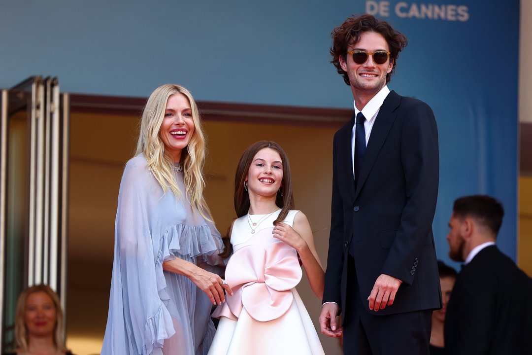 (L-R) Sienna Miller, Marlowe Sturridge, and Oli Green attend the 