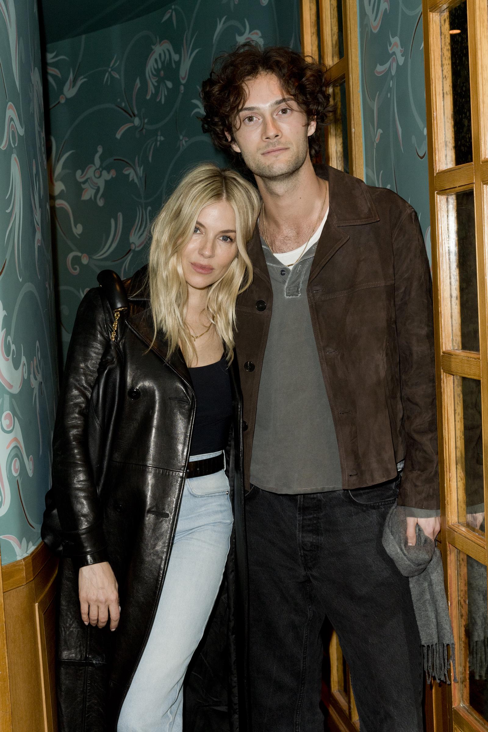 Sienna Miller and Oli Green at the Frame Dinner as part of Paris Ready to Wear Fashion Week at Caviar Kaspia on March 3, 2024, in Paris, France. | Source: Getty Images