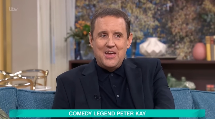 Seated comfortably on the sofa just moments later, Kay's dramatically leaner face and sharper jawline made him almost unrecognisable to some viewers. His appearance, though warmly received by many, sparked online debate and concern, with fans commenting on just how drastically the funnyman's look had changed since his time away from the public eye. | Source: YouTube/This Morning