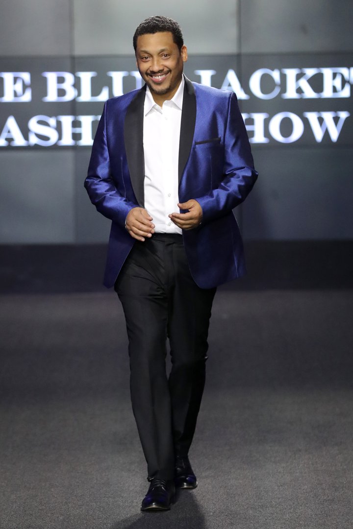 The actor walks the runway wearing Arjona Collection during the Sixth Annual Blue Jacket Fashion Show on February 17, 2022 | Source: Getty Images