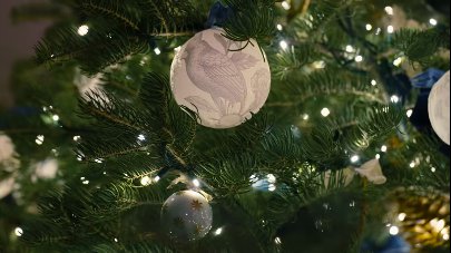A close-up of a bird ornament placed on a Christmas tree. | Source: Facebook/First Lady Melania Trump