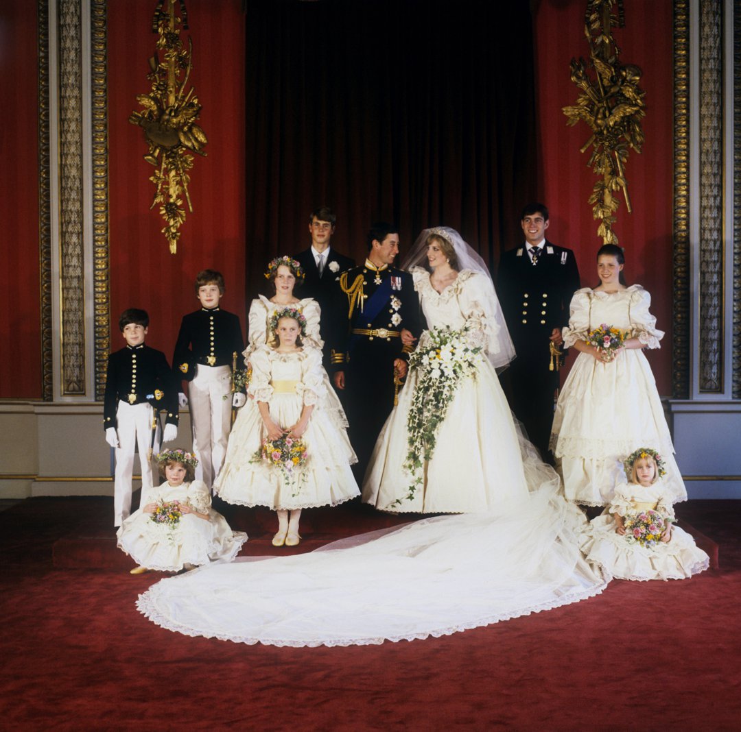 The then-Prince and Princess of Wales on their wedding day, with a young India Hicks standing beside the Prince.