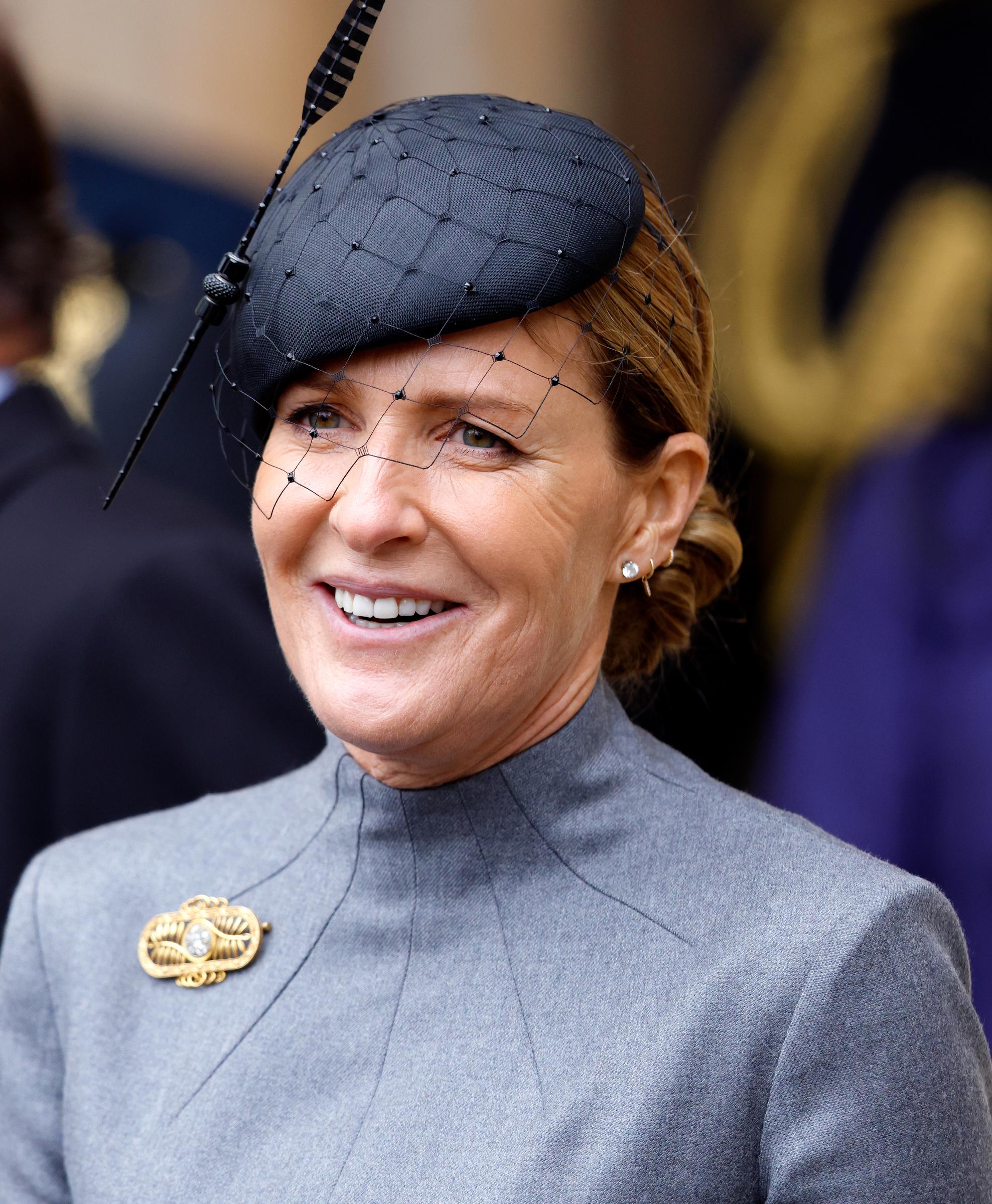 India Hicks is seen at the Service of Thanksgiving for the life of Prince Philip at Westminster Abbey on 29 March 2022, wearing a grey dress paired with a black veiled hat and gold brooch.