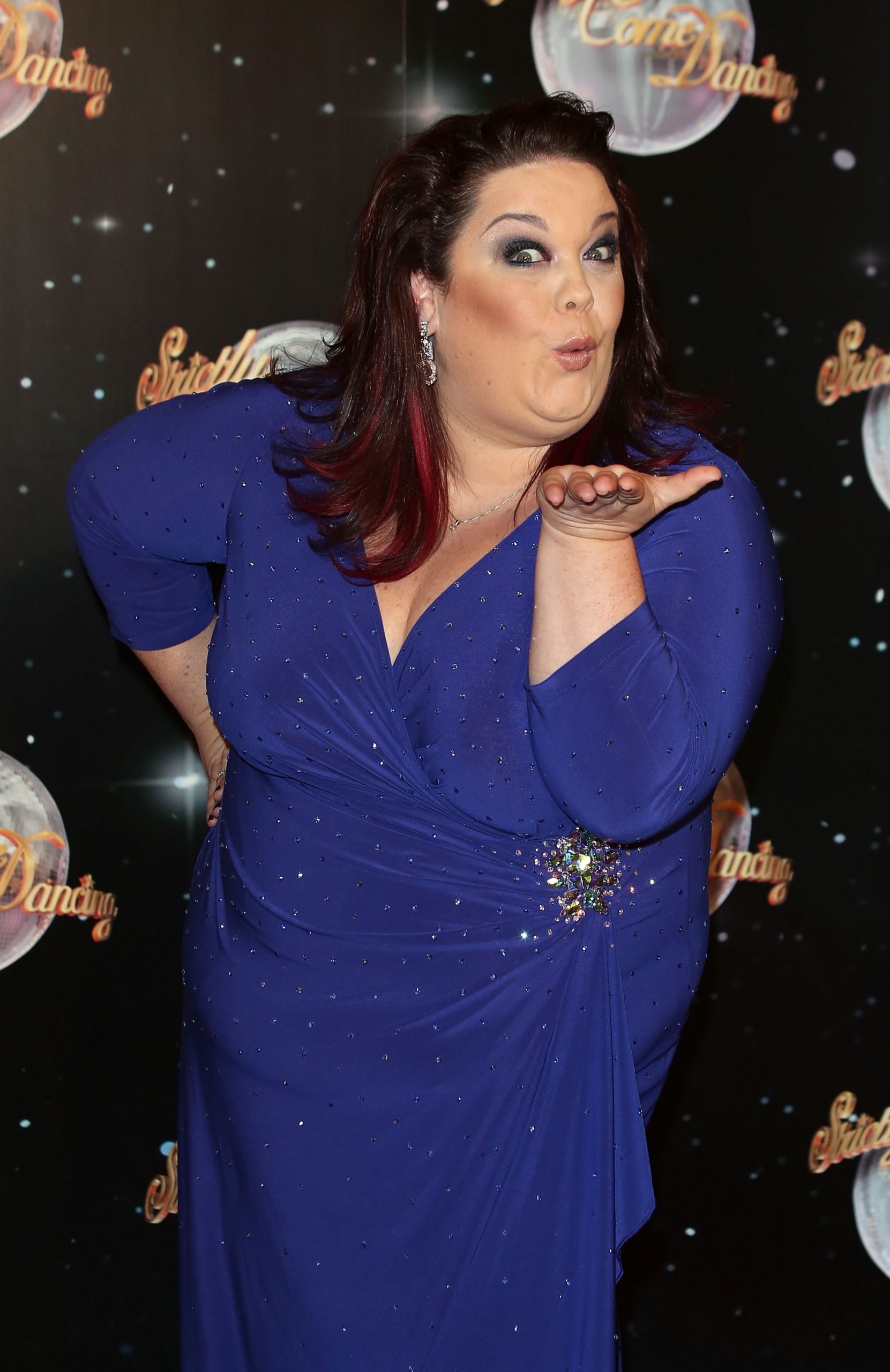 All eyes on Lisa! The Strictly star brings the glam in a sparkling royal-blue gown, blowing a playful kiss to photographers at the show’s 2012 launch on 11 September — and stealing the spotlight at BBC Television Centre.