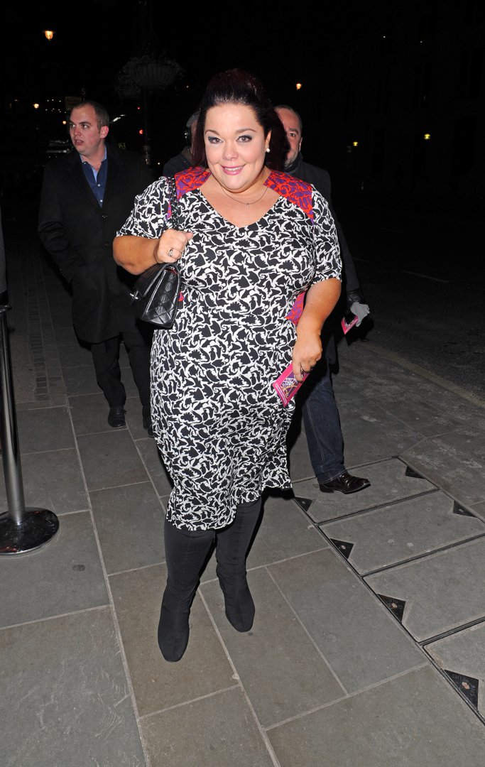 Bold and beaming! Riley is spotted stepping out at London's Trafalgar Hotel on 11 March 2013, turning heads in a dramatic black-and-white print dress and sleek black boots during her evening arrival.
