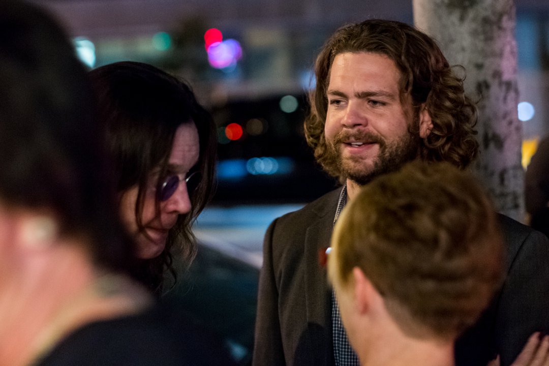 Ozzy Osbourne and his son Jack are pictured together at the opening of 