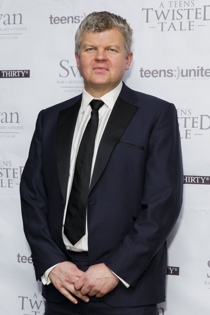 Adrian Chiles attends the Teens Unite Charity Ball at Underglobe on November 22, 2014, in London, England. | Source: Getty Images