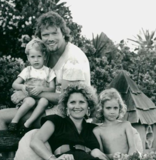 Richard Branson and Joan Templeman, with their children, Holly and Sam, from a post dated November 26, 2025. | Source: Instagram/richardbranson