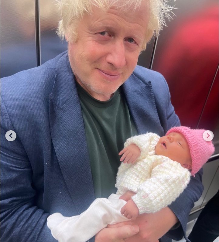 Boris Johnson holding his youngest, Poppy | Source: Instagram/carrielbjohnson