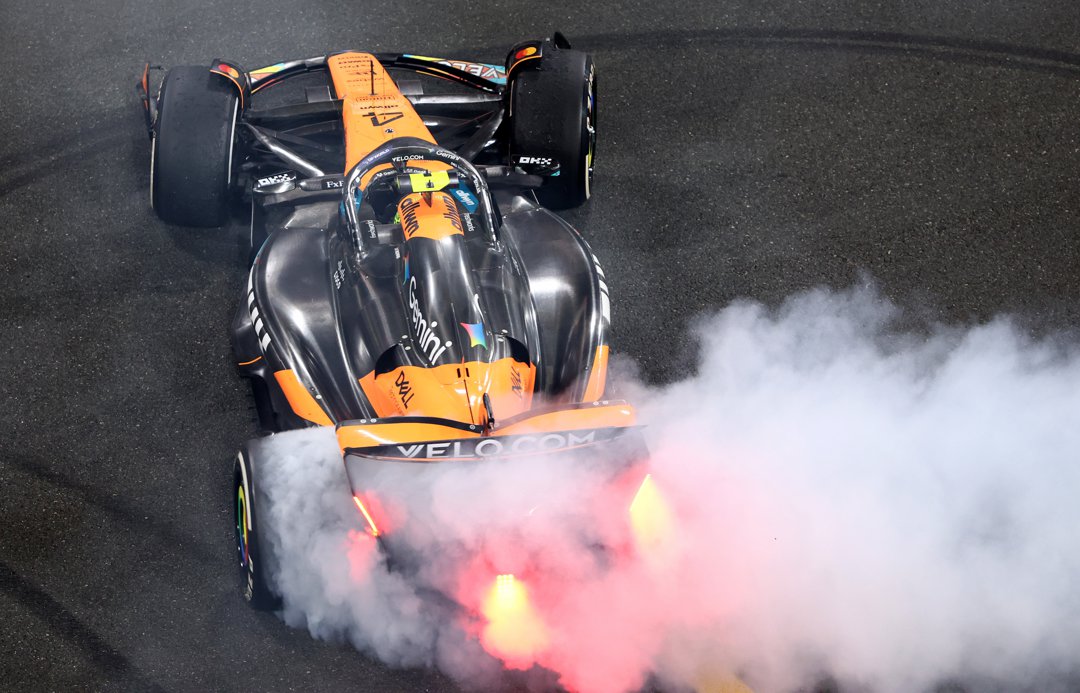 Lando Norris driving the (4) McLaren MCL39 Mercedes performs donuts in celebration on December 07, 2025 in Abu Dhabi, United Arab Emirates | Source: Getty Images