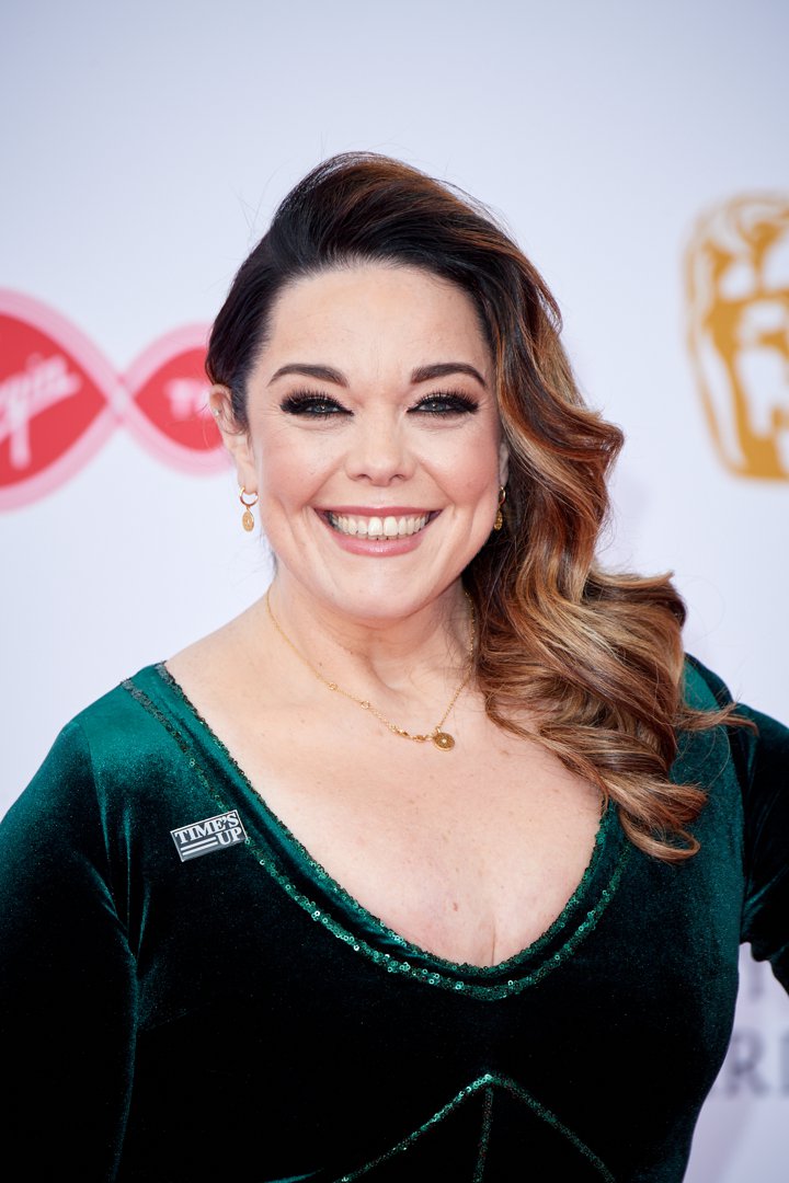 Lisa Riley lit up the red carpet at the Virgin TV British Academy Television Awards in London on May 13, 2018, wearing an elegant emerald green velvet gown with sequin detailing and a 