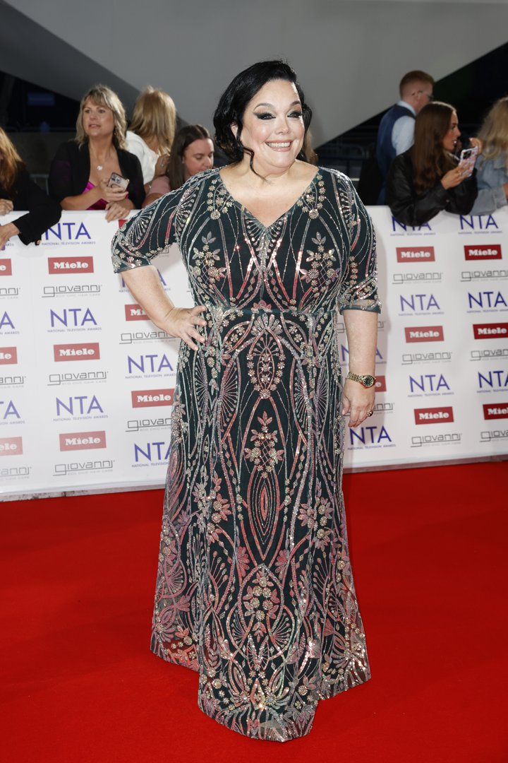 Lisa Riley stunned on the red carpet at the National Television Awards in London on September 10, 2025, wearing an intricately embellished floor-length gown in jewel tones. Radiating confidence, the actor showcased the results of a near decade-long transformation — having dropped 12 stone, undergone multiple surgeries, and lost a further 20 pounds during her time on 