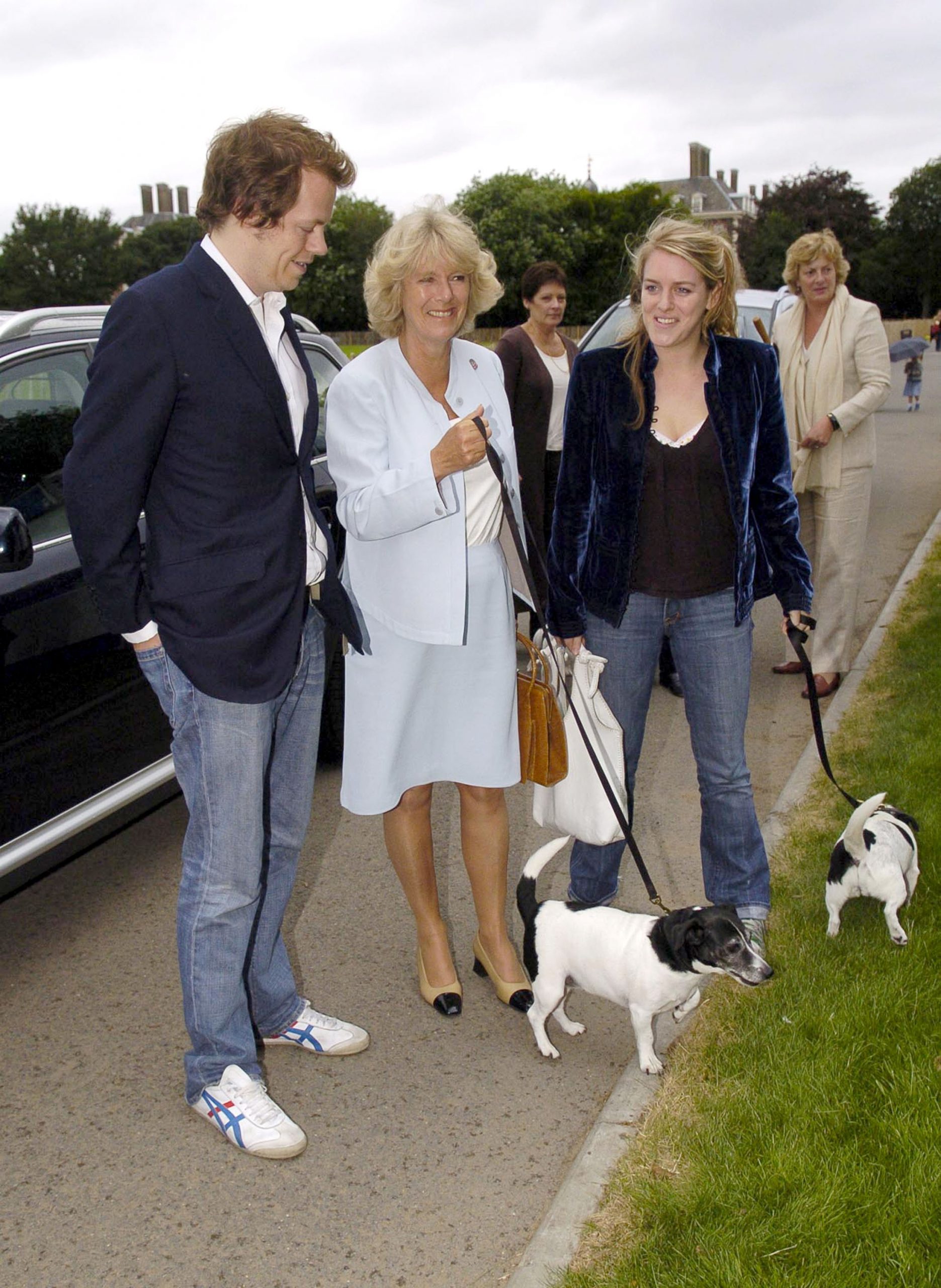 Tom Parker Bowles, Queen Camilla, and Laura Lopes during Macmillan Dog Day on July 5, 2005. | Source: Getty Images