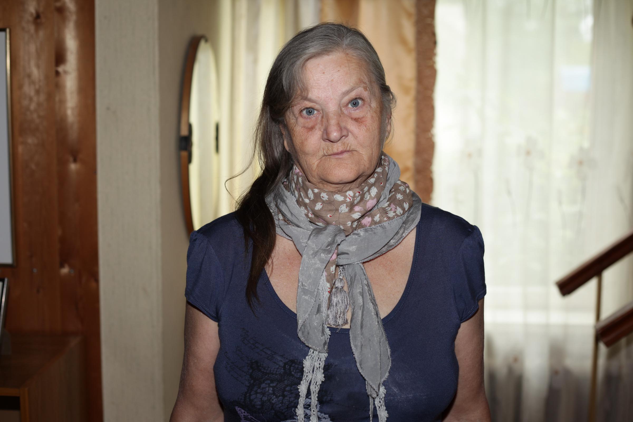 Elderly woman looking at someone off camera | Source: Shutterstock