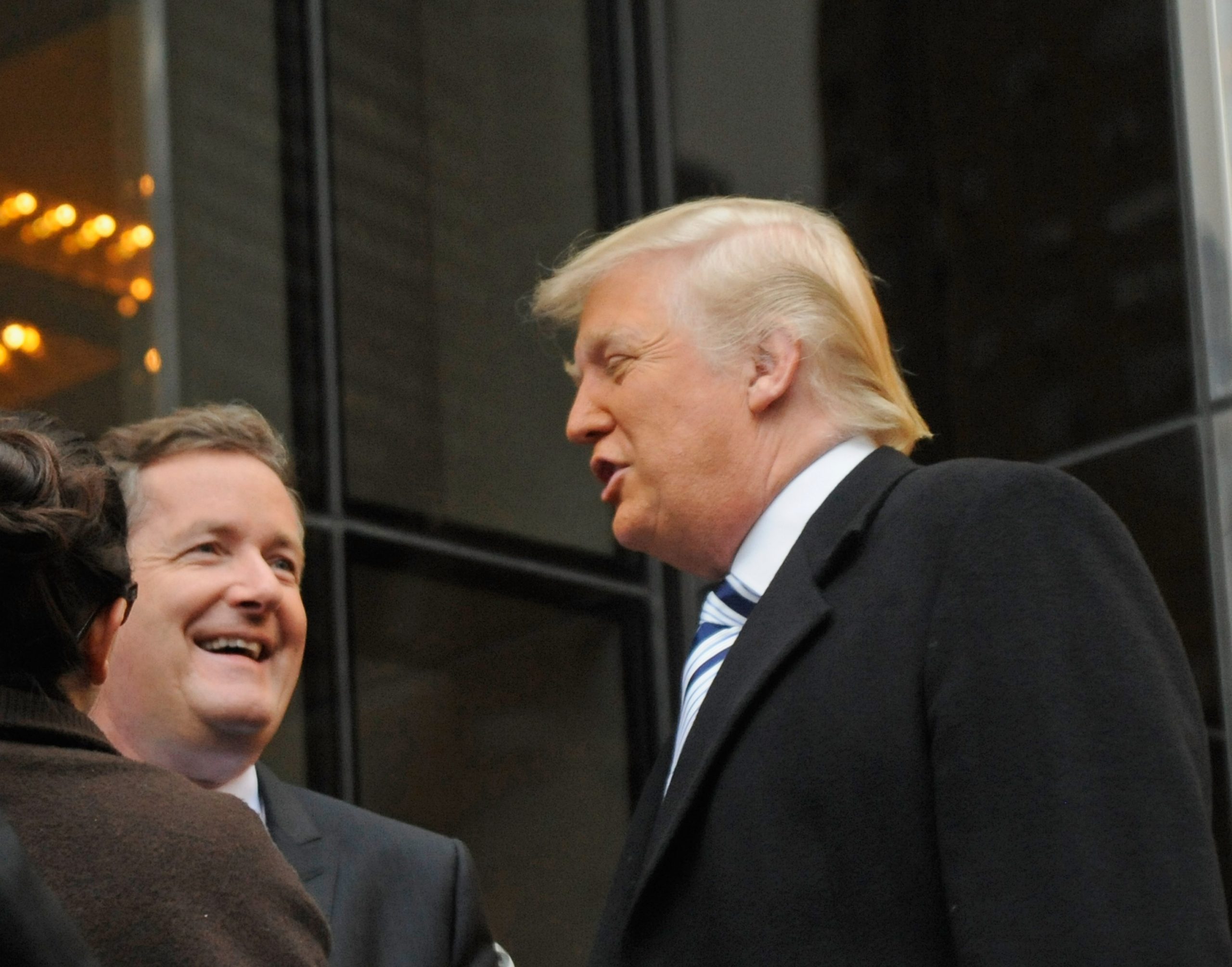 Piers Morgan and Donald Trump while filming on location for 