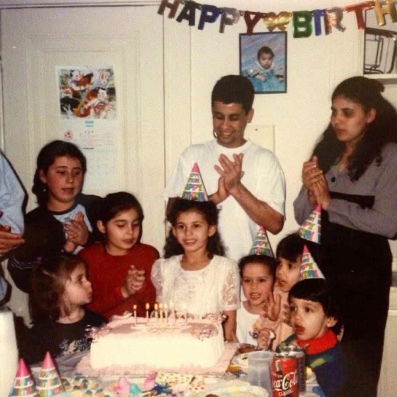 A young Bruna Ferreira in a picture with family during a birthday party, from a funraiser created by Graziela Dos Santos Rodrigues | Source: GoFundMe