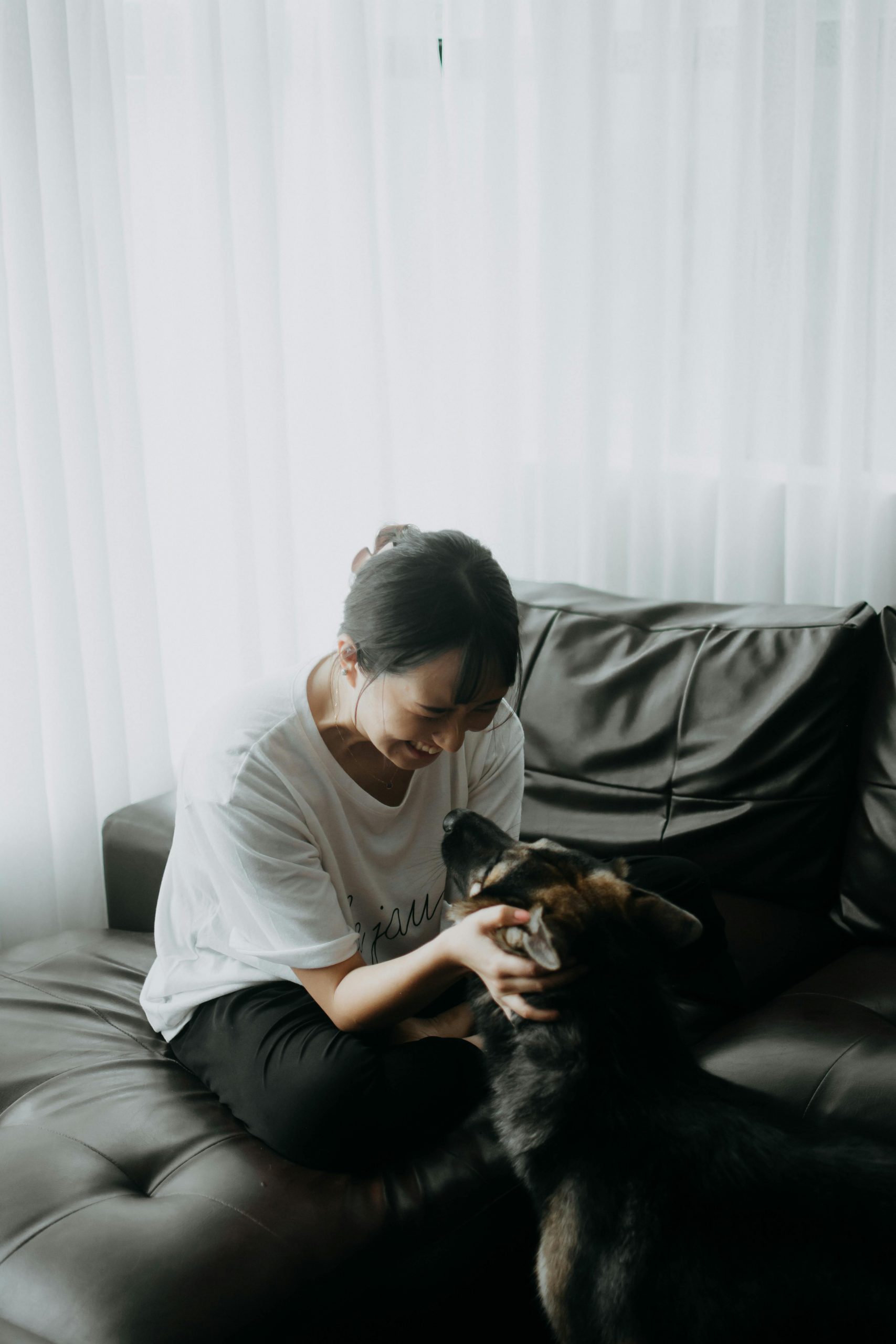 A woman with her pet | Source: Pexels