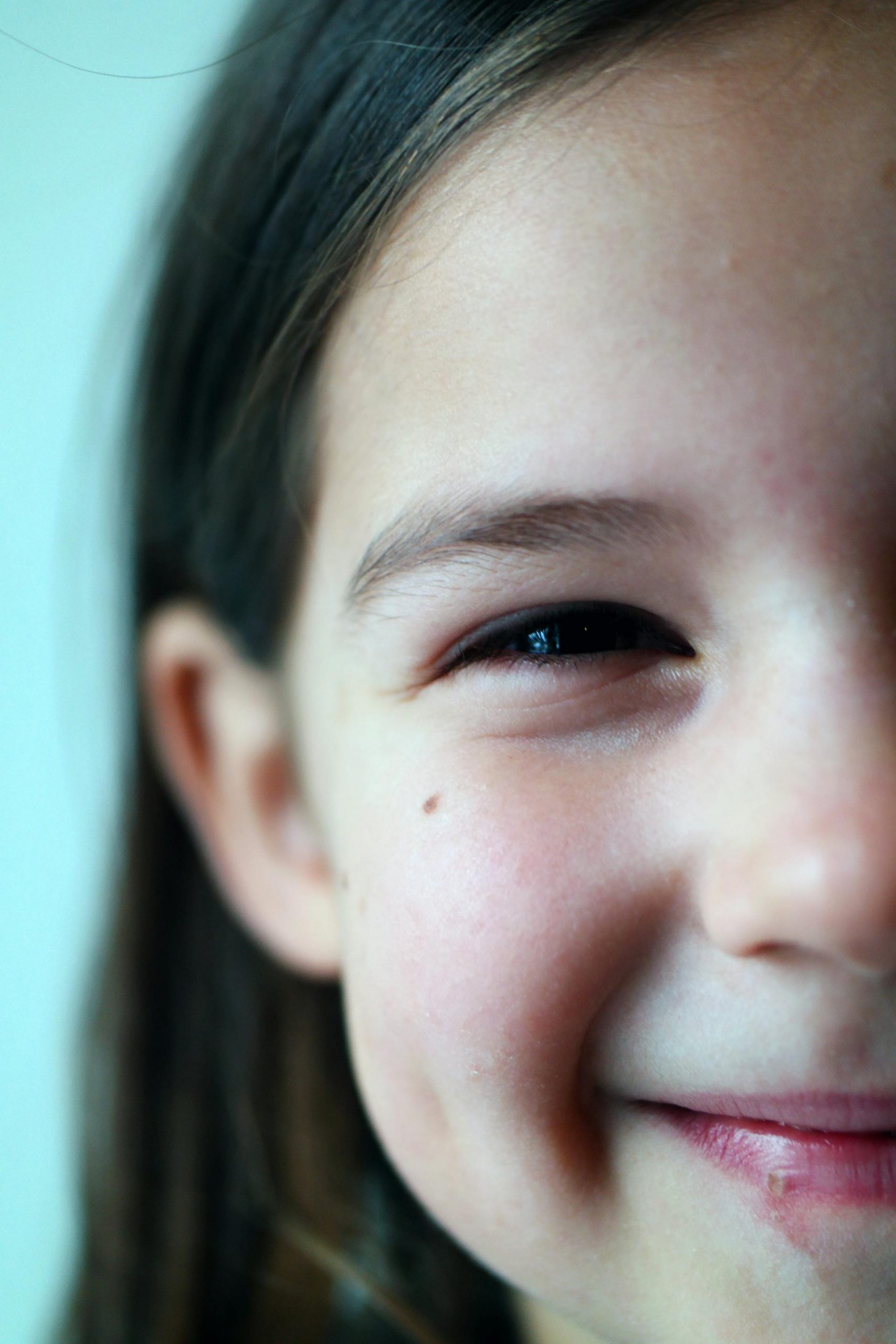 A smiling young girl | Source: Pexels