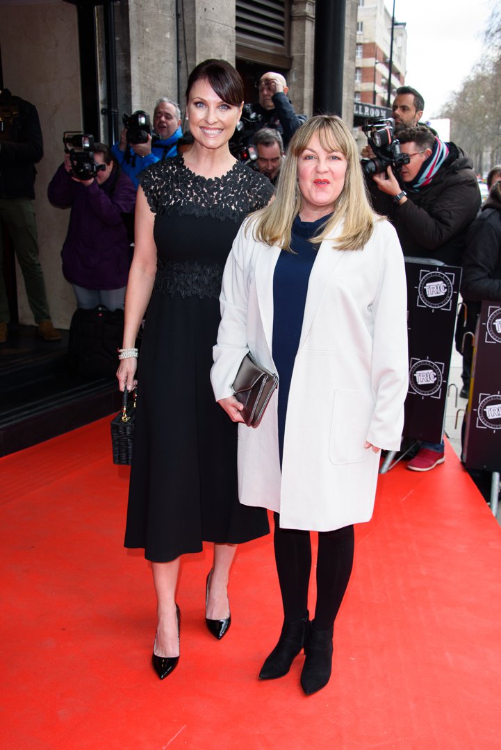 Emma Barton and Lorraine Stanley dazzle at the 2018 TRIC Awards, turning heads outside London's Grosvenor House Hotel on 13 March. The 