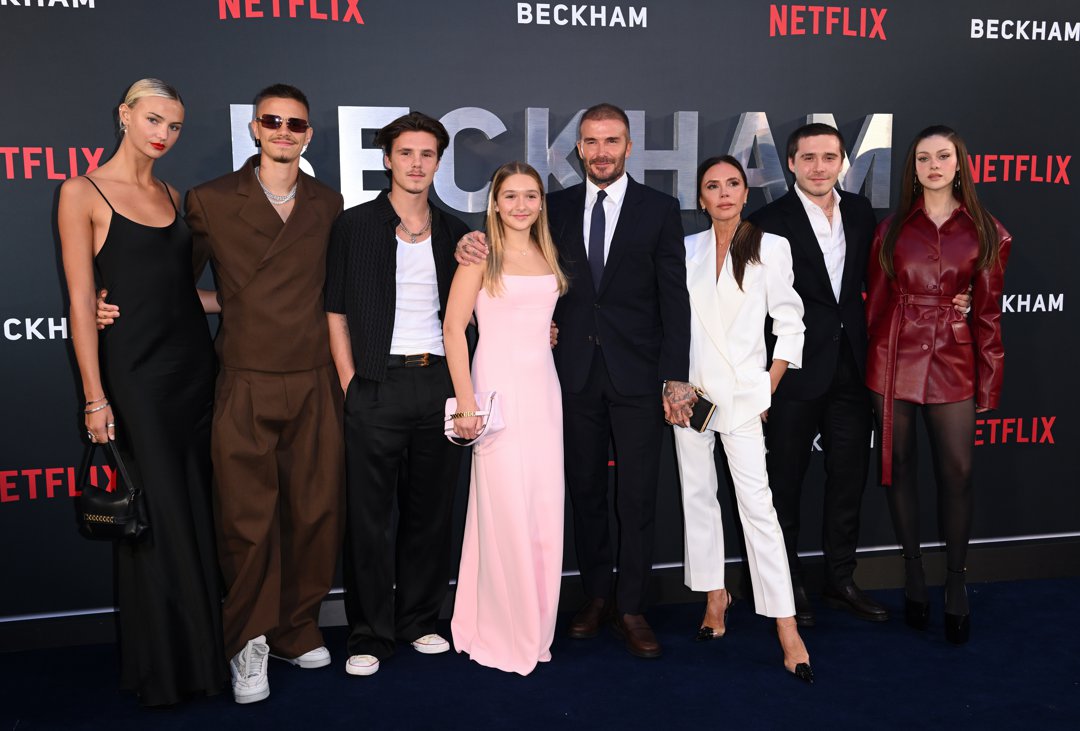 Mia Regan, Romeo Beckham, Cruz Beckham, Harper Beckham, David Beckham, Victoria Beckham, Brooklyn Peltz Beckham, and Nicola Peltz Beckham at the Netflix