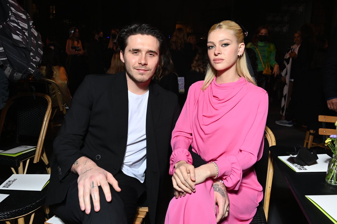 Brooklyn Beckham and Nicola Peltz attend the Valentino Womenswear Spring/Summer 2022 show as part of Paris Fashion Week on 1 October 2021 in Paris, France. | Source: Getty Images
