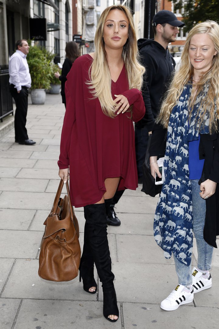 Turning the streets into a catwalk, Crosby nailed off-duty glam arriving at Heat Radio Studios on 15 October 2015 in London, rocking a flowing burgundy mini, sky-high black boots, and a statement handbag that tied it all together.