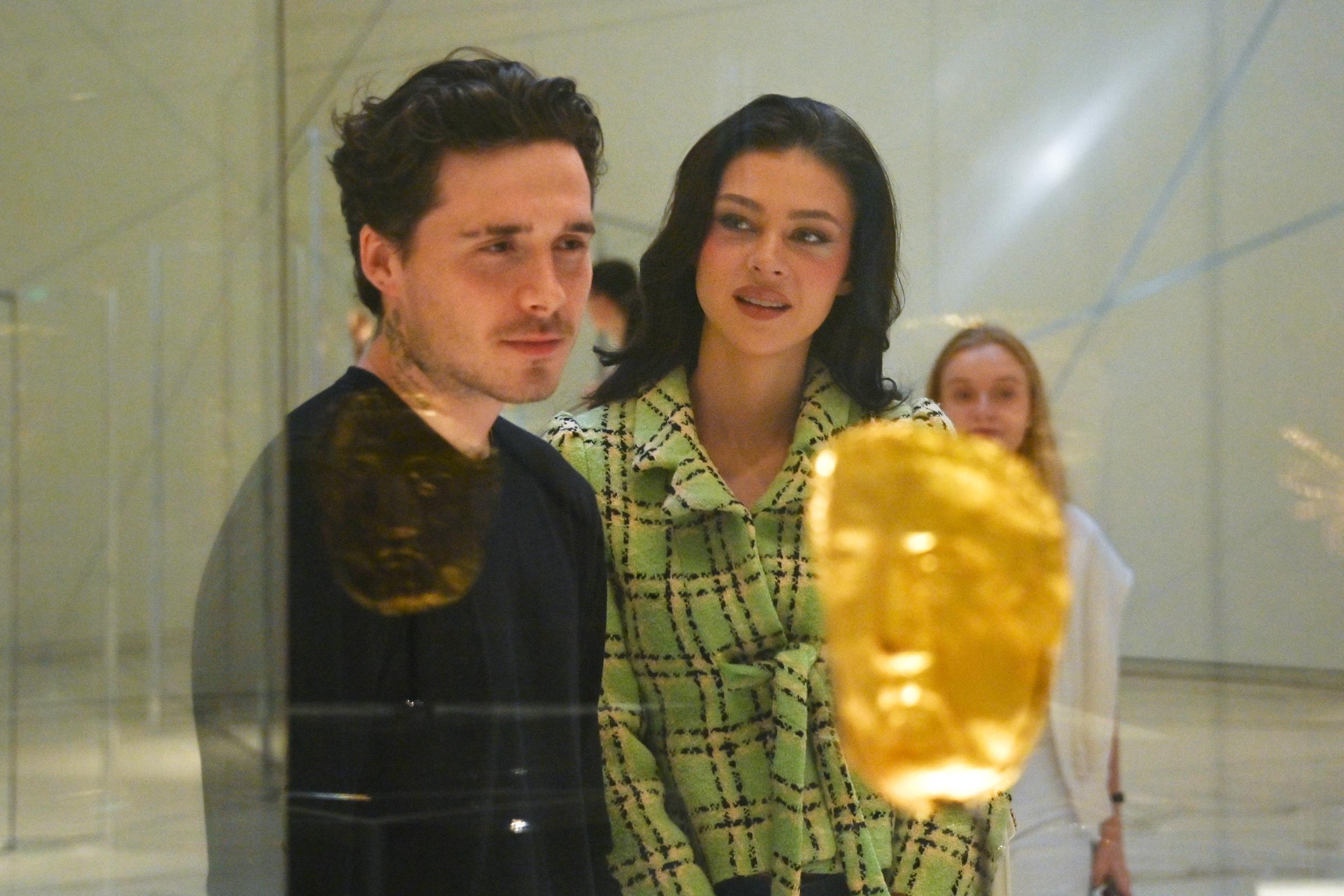 Brooklyn Beckham and Nicola Peltz visit Abu Dhabi's architectural and artistic highlight Louvre Abu Dhabi ahead of this weekend's F1 race at Yas Marina Circuit on 7 December 2024 in Abu Dhabi, United Arab Emirates. | SOurce: Getty Images
