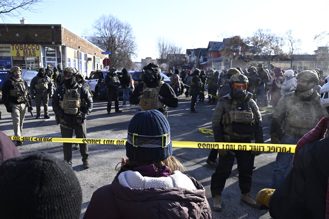 Federal agents block off the scene of a shooting as crowds gather in Minneapolis, Minnesota on January 24, 2026. | Source: Getty Images