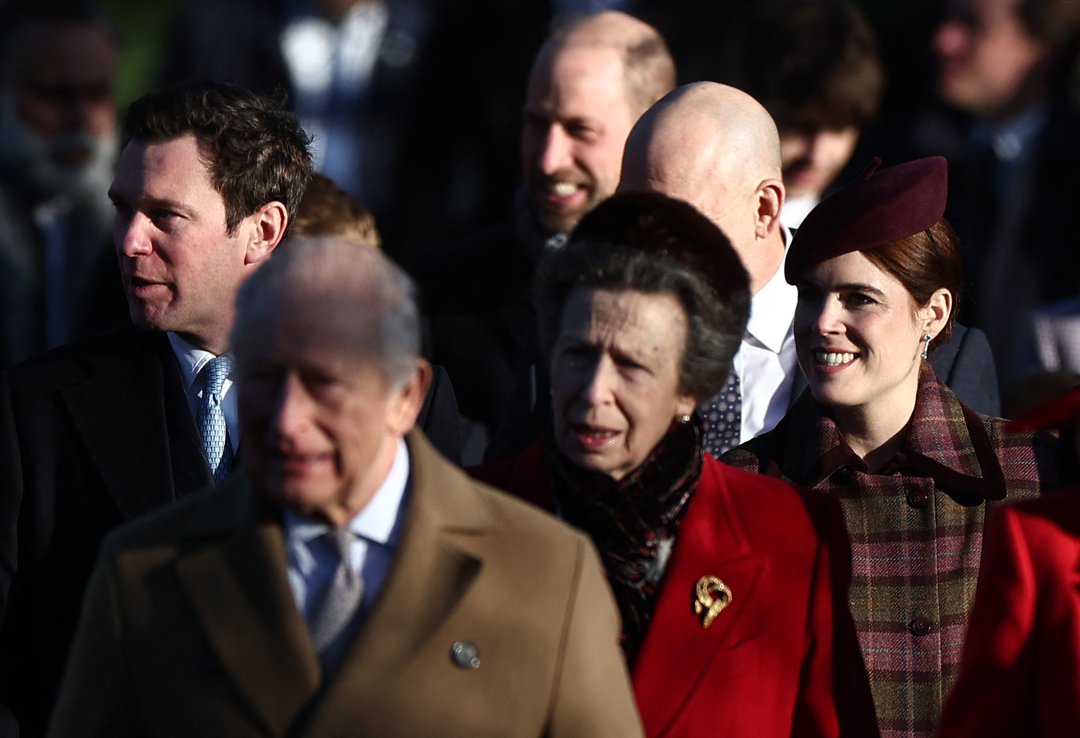 King Charles III leads senior royals away from St Mary Magdalene Church after the Christmas Day service on the Sandringham Estate, joined by Anne, Princess Royal, Queen Camilla, and Princess Eugenie. The annual walk remains one of the most public displays of royal togetherness during the festive period.
