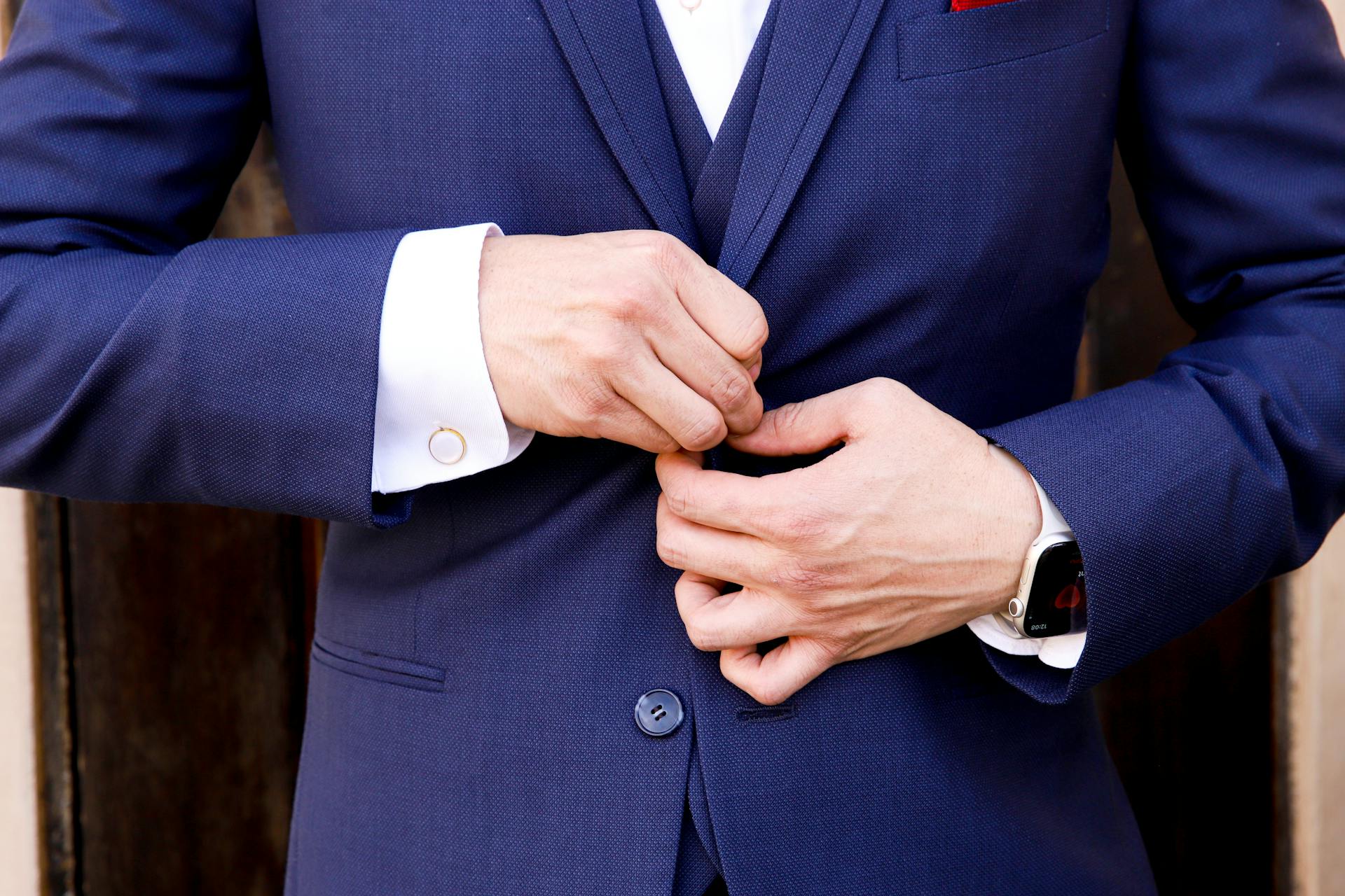 A close-up shot of a man in a navy suit | Source: Pexels