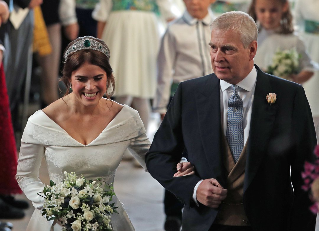 Princess Eugenie walks down the aisle with her father, Andrew Mountbatten-Windsor, for her wedding to Jack Brooksbank at St George's Chapel in Windsor Castle on 12 October 2018 in Windsor, England. | Source: Getty Images