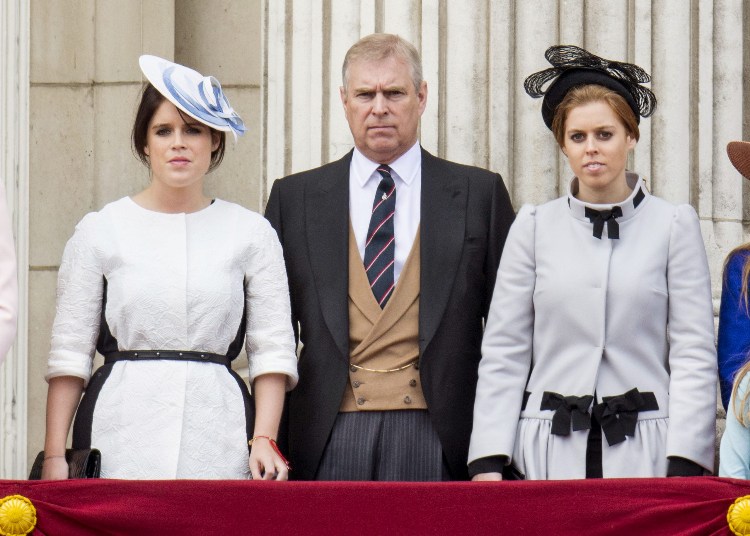 Princess Eugenie and Princess Beatrice with their father Andrew Mountbatten-Windsor during the annual Trooping The Colour ceremony at Buckingham Palace on 15 June 2013 in London, England. | Source: Getty Images